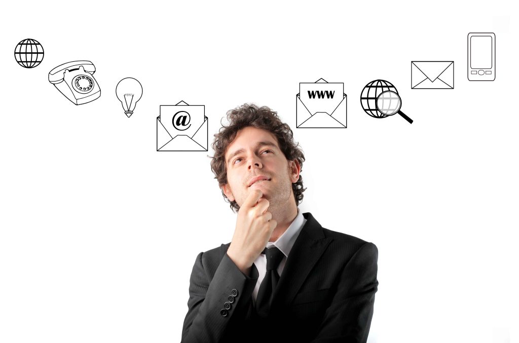 Thoughtful businessman with icons on the background
